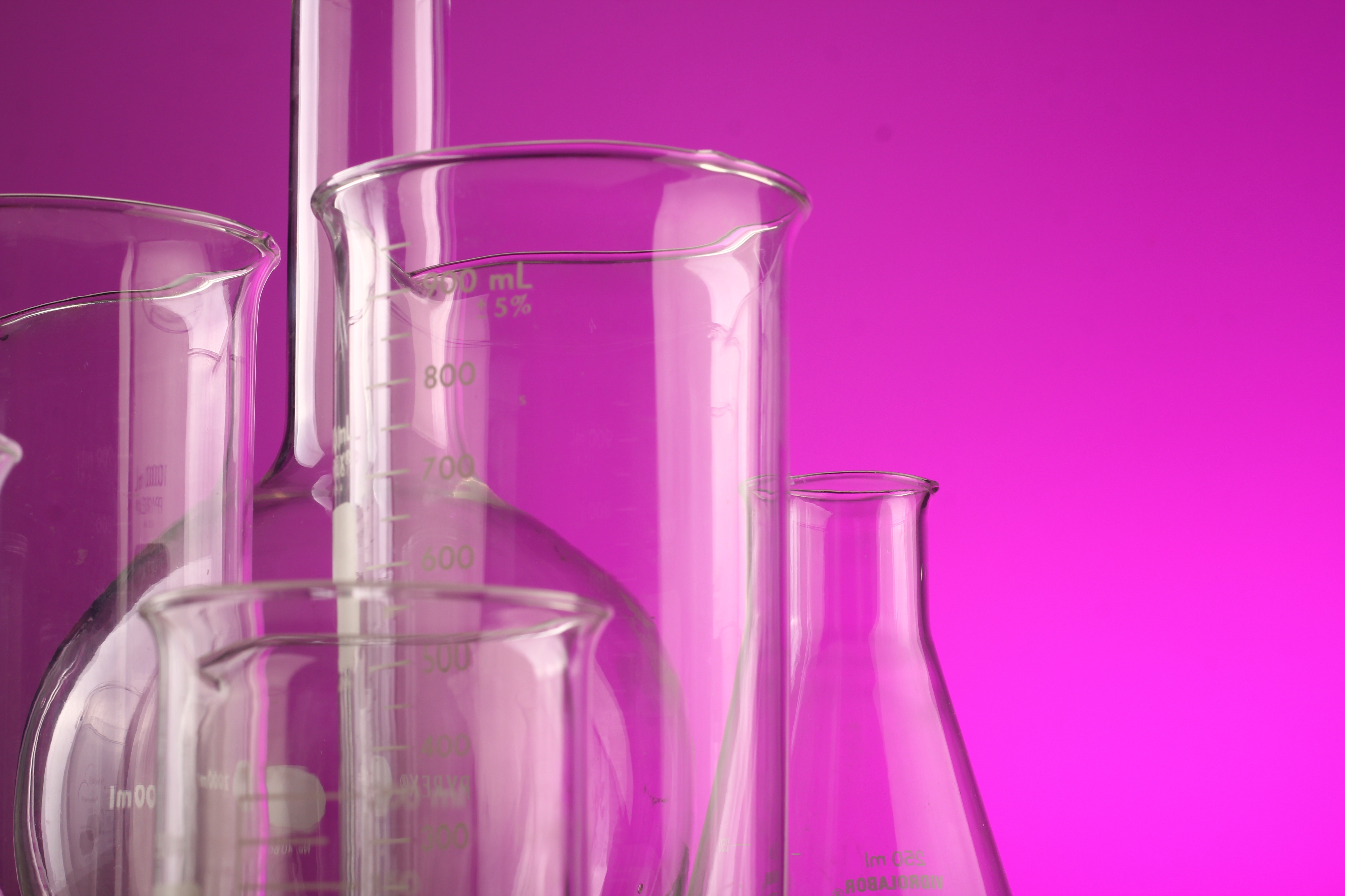 Several laboratory beakers and cylinders