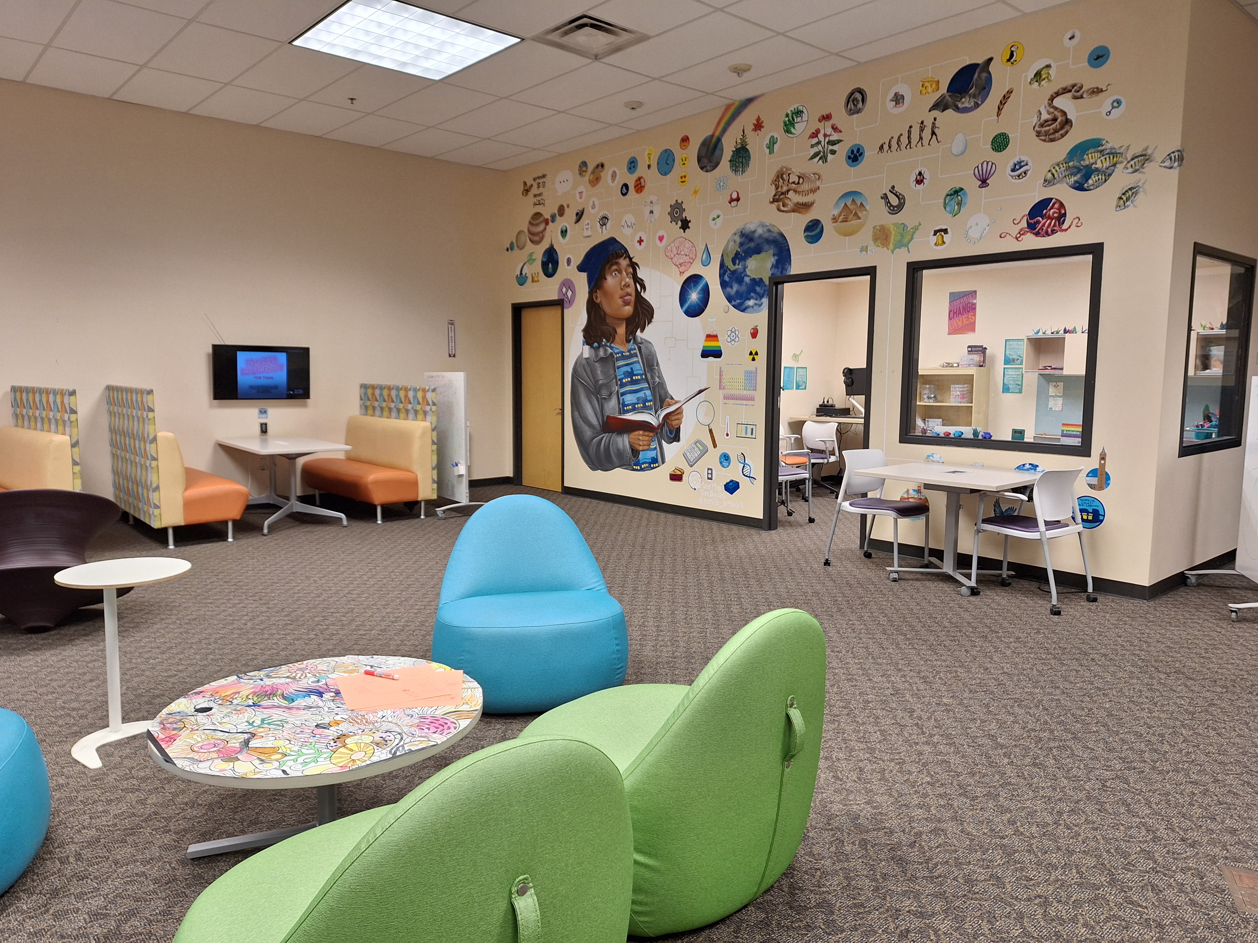 TCPL Teen Center with a view of the mural and the craft room