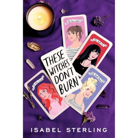 Photo of the book cover, which is purple and features illustrations of four teen girls on tarot cards