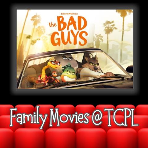 Image from the movie Bad Guys on a theater screen in front of red seats